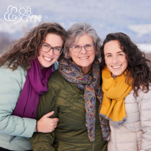 three women's standing outside in winter jackets