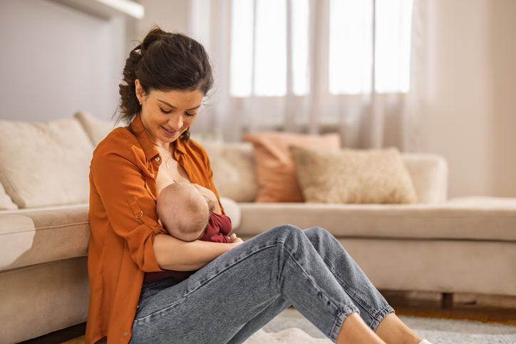 mother breastfeeding while managing mental health